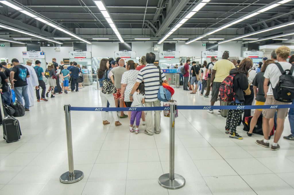 This image has an empty alt attribute; its file name is Queues-of-Passengers-departure-at-passport-control-desk-in-the-airport-2048x1365-1024x683.jpg